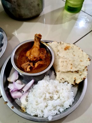 Chiken Rassa With Rice And Rice Flour Bhakhar,onion